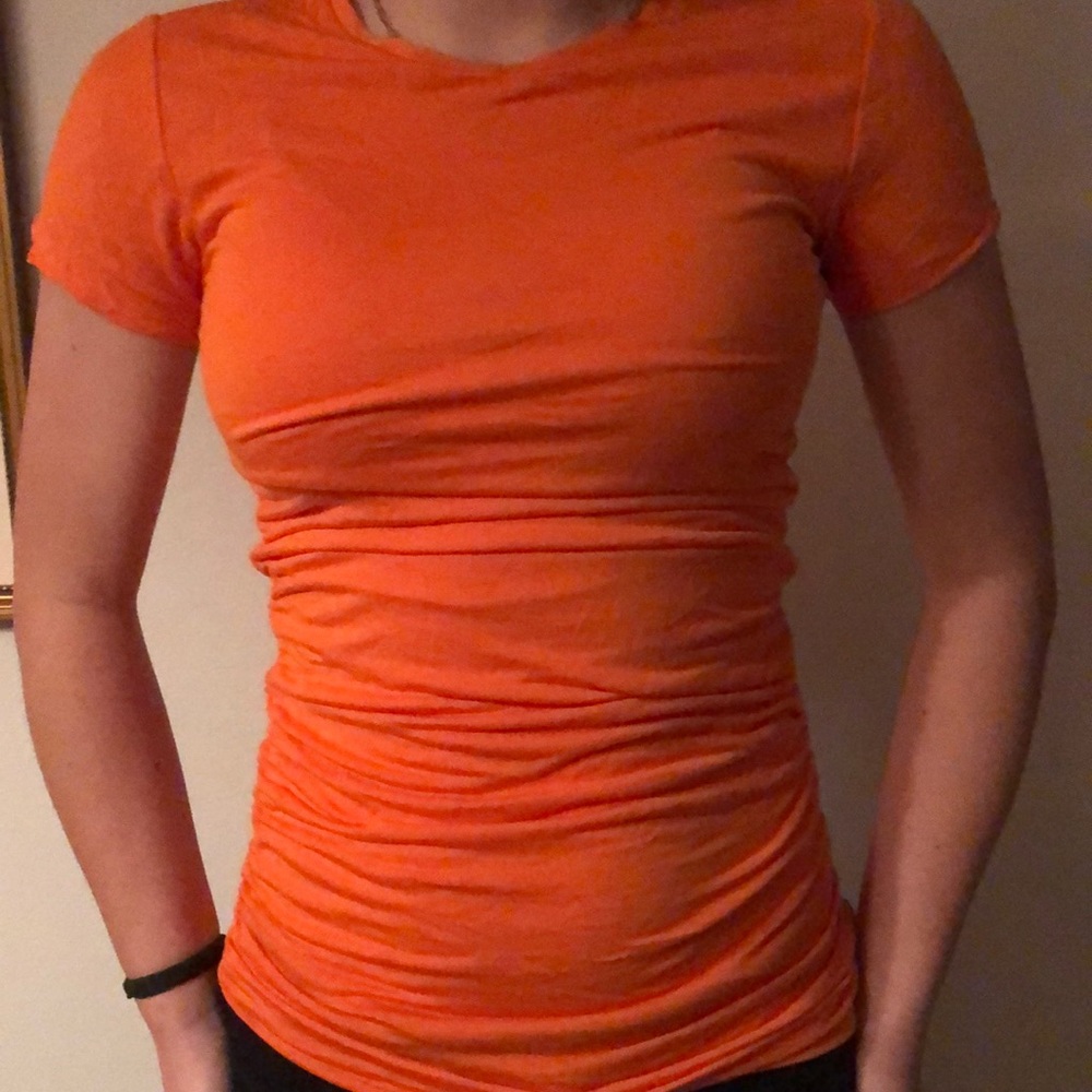 Orange Ralph Lauren tight shirt with a scrunch